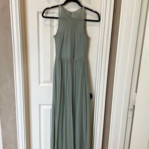 Sage green sleeveless bridesmaid dress with pockets